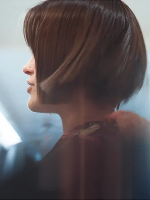 Haircut NYC red bob side view Color And Andy Bowery salon