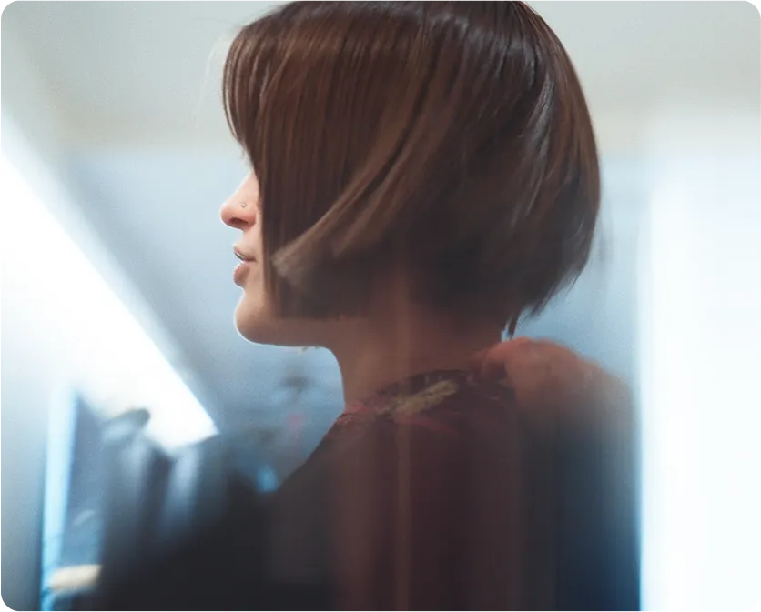 Haircut NYC red bob side view Color And Andy Bowery salon