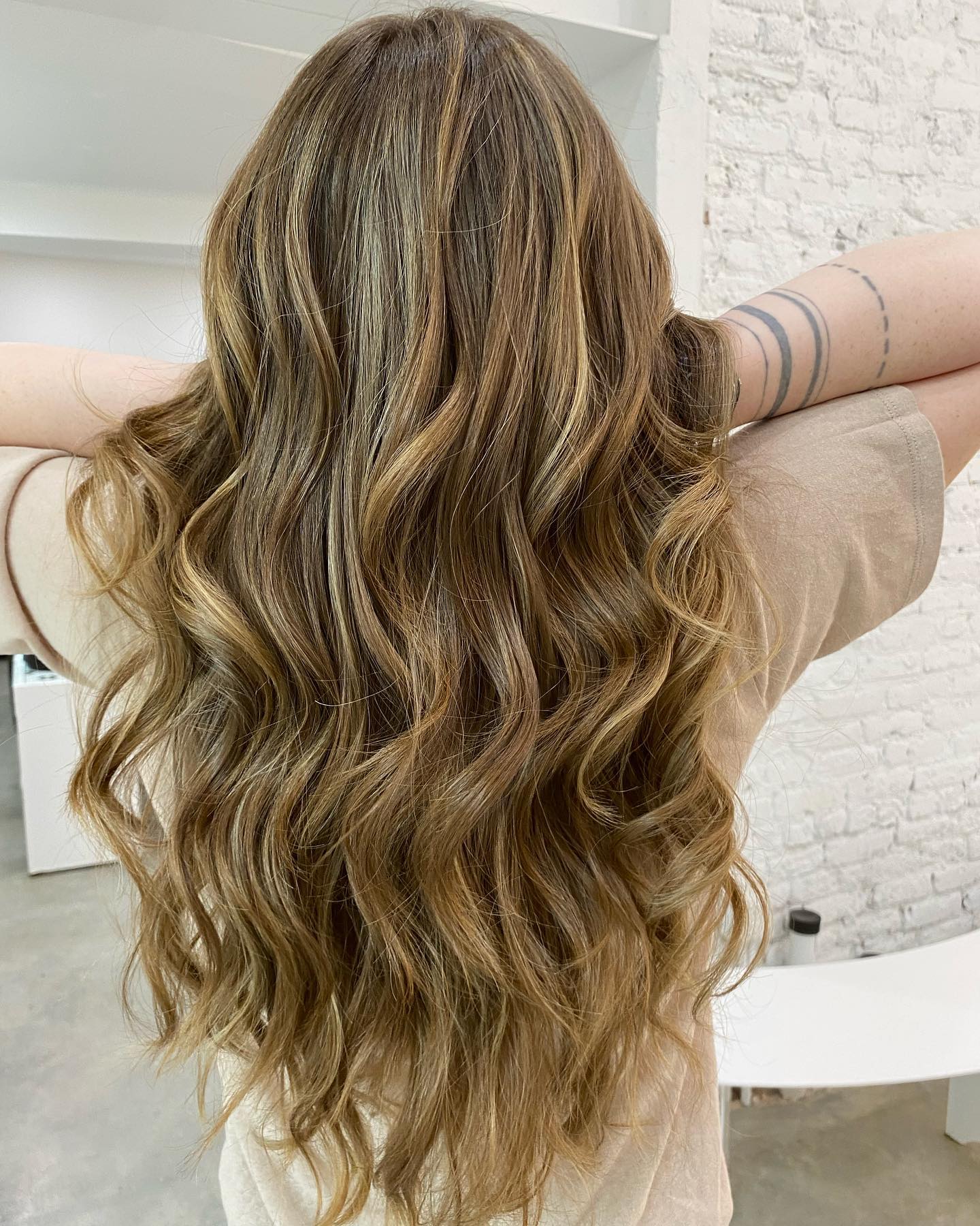 Highlights NYC long curly blonde specialist hair Color And Andy Bowery hair salon