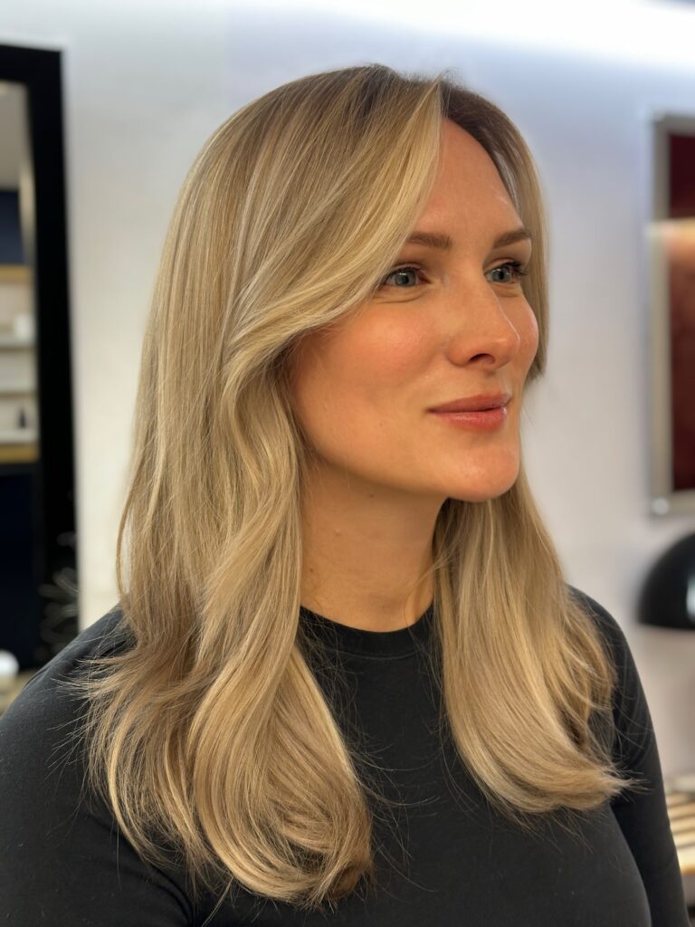 Keratin treatment NYC smooth hair result Color And Andy Bowery salon. Hair salon Bowery NYC blonde client Color And Andy