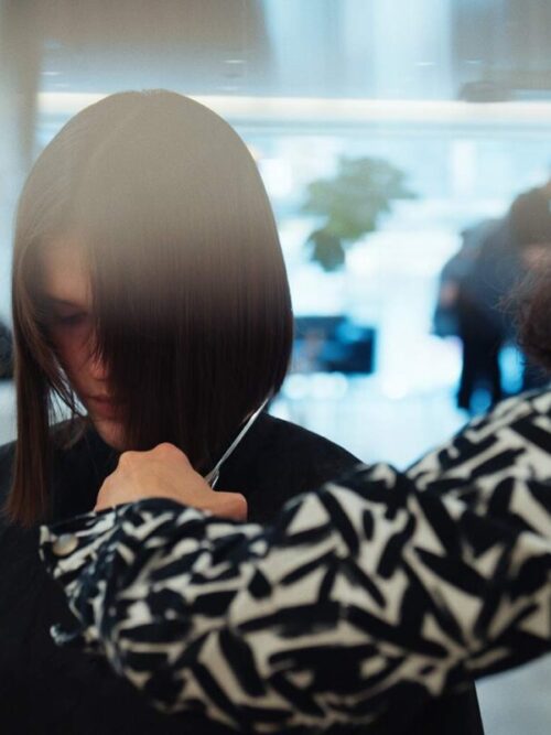 Precision haircut being done at Color And Andy hair salon on the Bowery, NYC